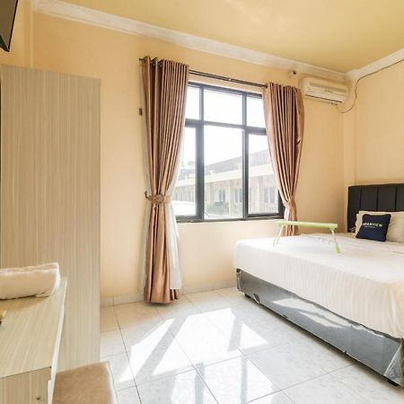 Urbanview Hotel Nugraha Palembang By Reddoorz Extérieur photo
